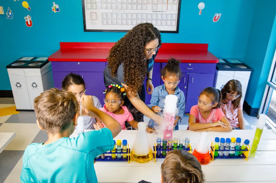 Children playing educational games at the museum